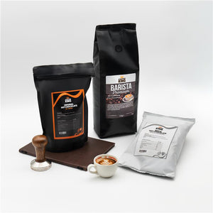 Three coffee products including a bag of hot chocolate, a bag of coffee beans, and a package of coffee powder on a white background.